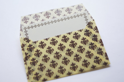 【メーカー廃番】ワックスペーパーの封筒　紋章（黄×茶）の商品写真